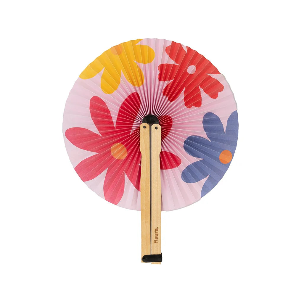 pai pai abierto con un estampado de flores de colores y fondo rosa