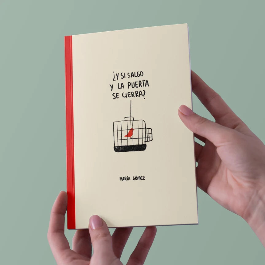 cuaderno encolado de la marca voraz con un dibujo de un pájaro de color rojo en una jaula y con el texto ¿y si salgo y la puerta se cierra?