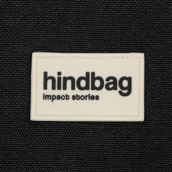 Logo de Hindbag sobre tela negra.