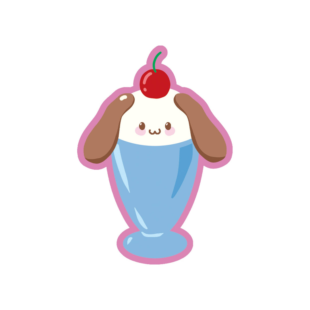 pegatina con forma de una copa de helado con cara de perrito de orejas largas y una cereza en lo alto