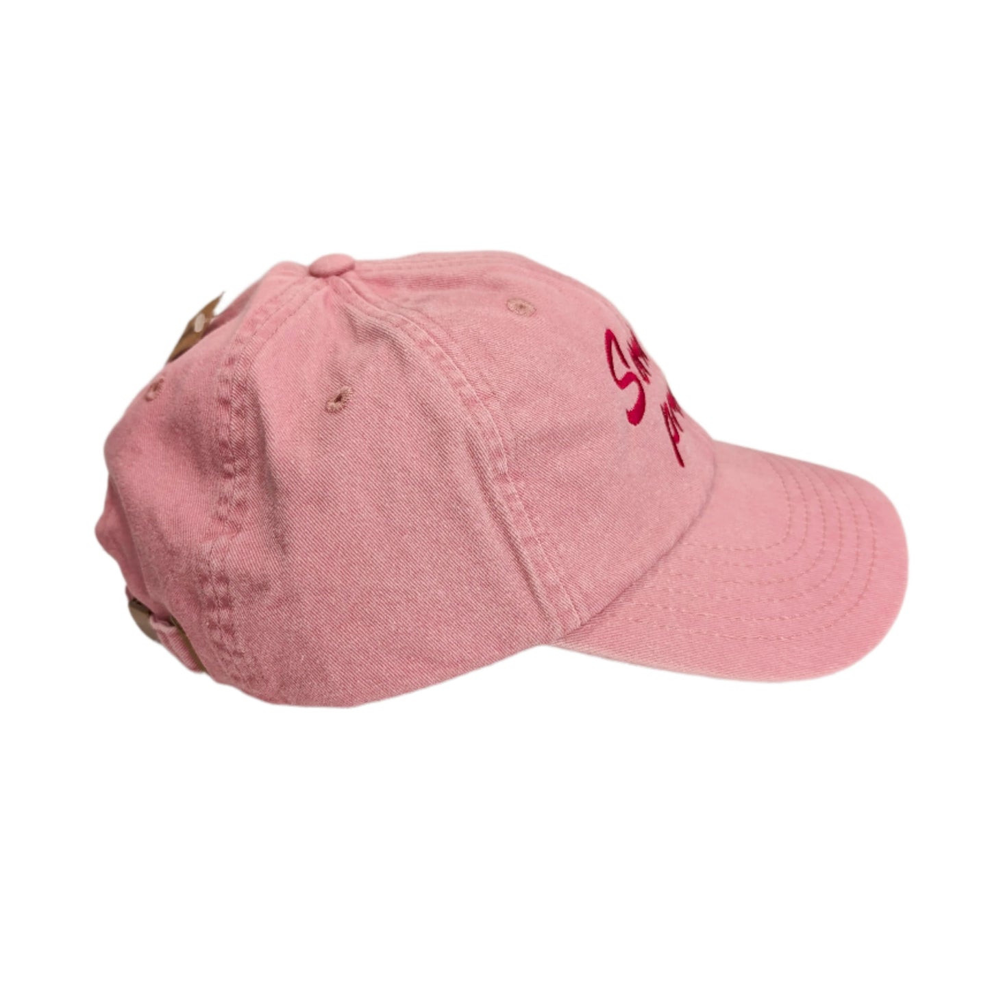 gorra de lado con la frase en valenciano serà percís en color rosa