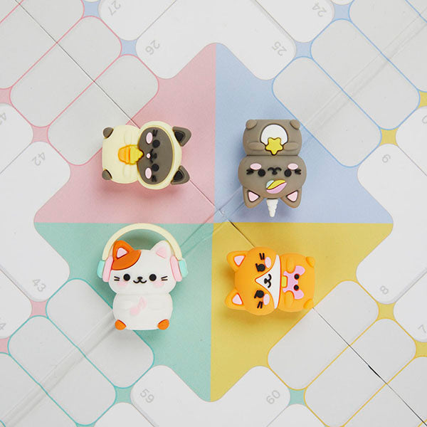 Cuatro piezas del juego del parchís con forma de gatitos