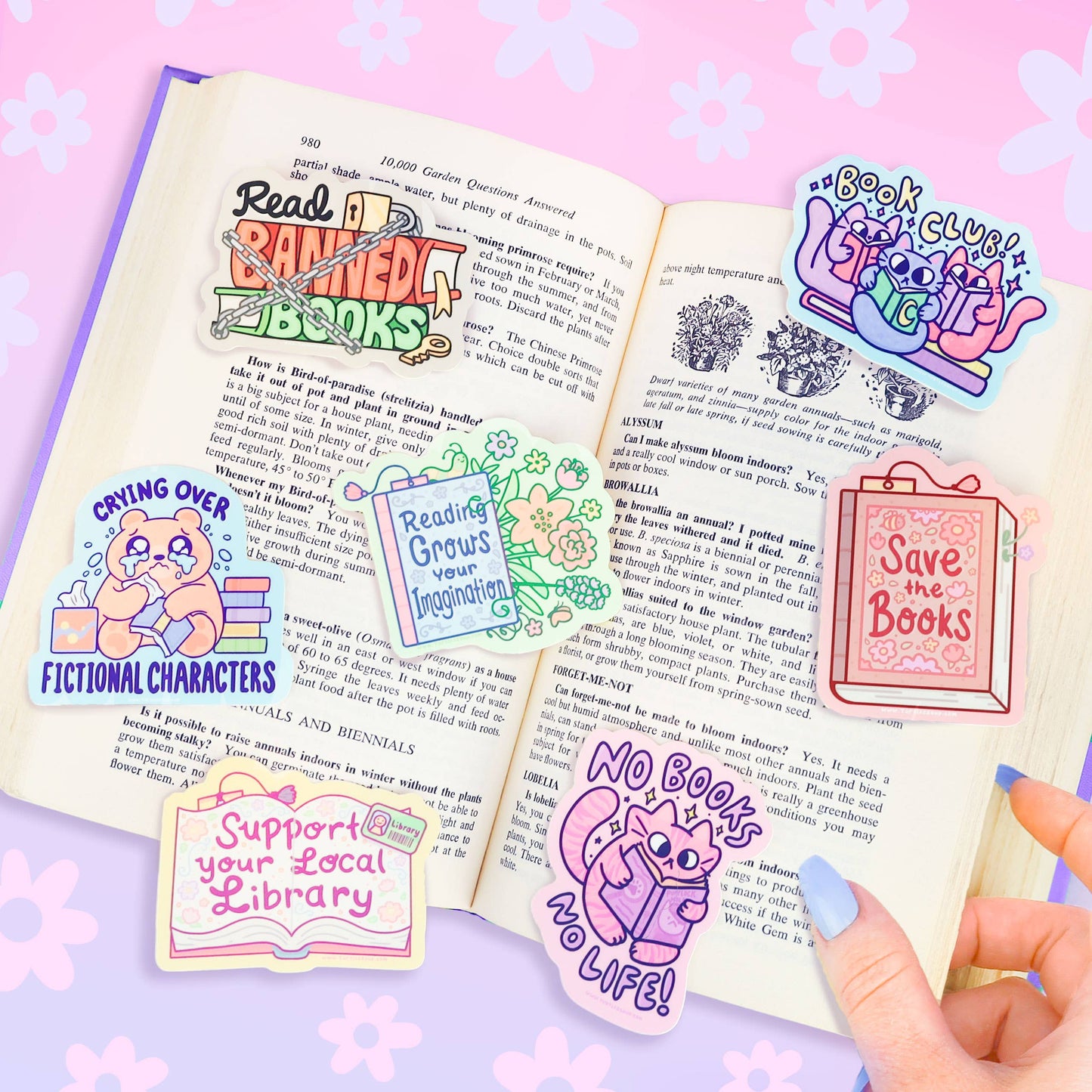 Conjunto de pegatinas de la temática de libros y de lectura de Turtle's Soup sobre un libro abierto.