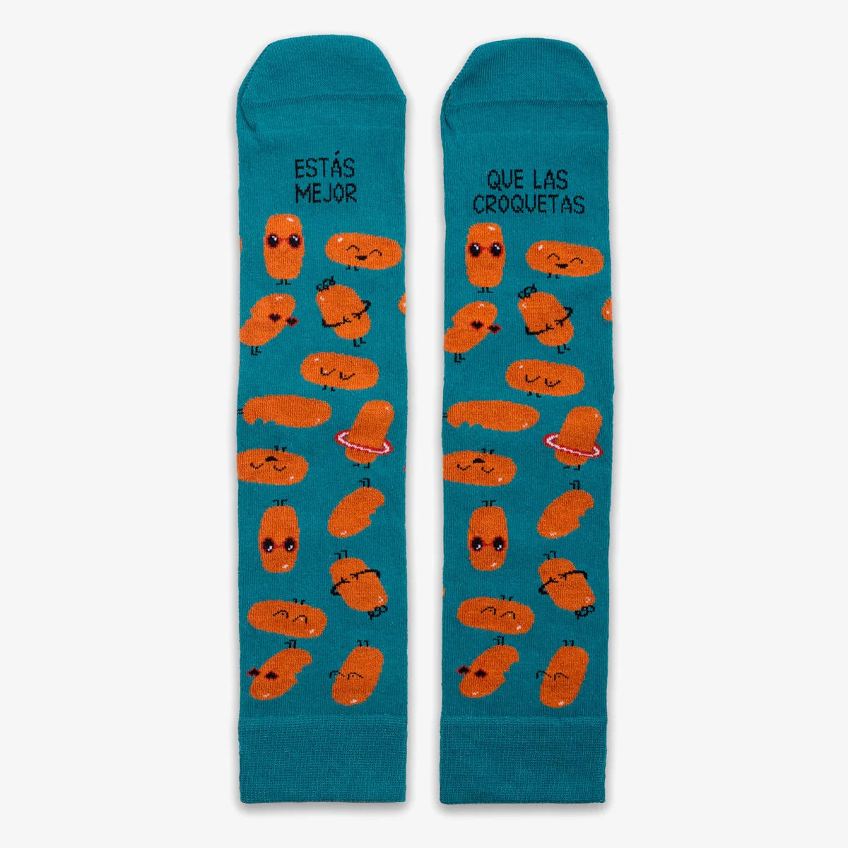 Calcetines azules con el texto Estás mejor que las croquetas y dibujos de croquetas molonas con gafas de sol y caritas felices