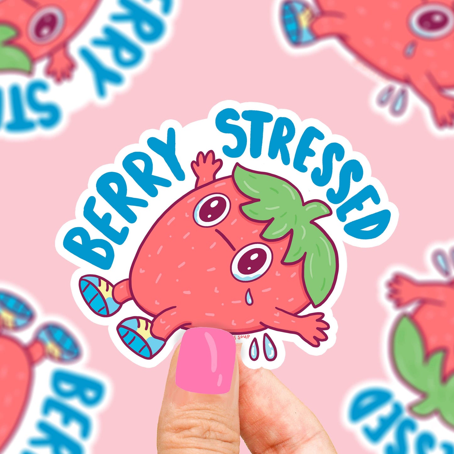 Pegatina de una fresa tumbada llorando y el mensaje Berry Stressed
