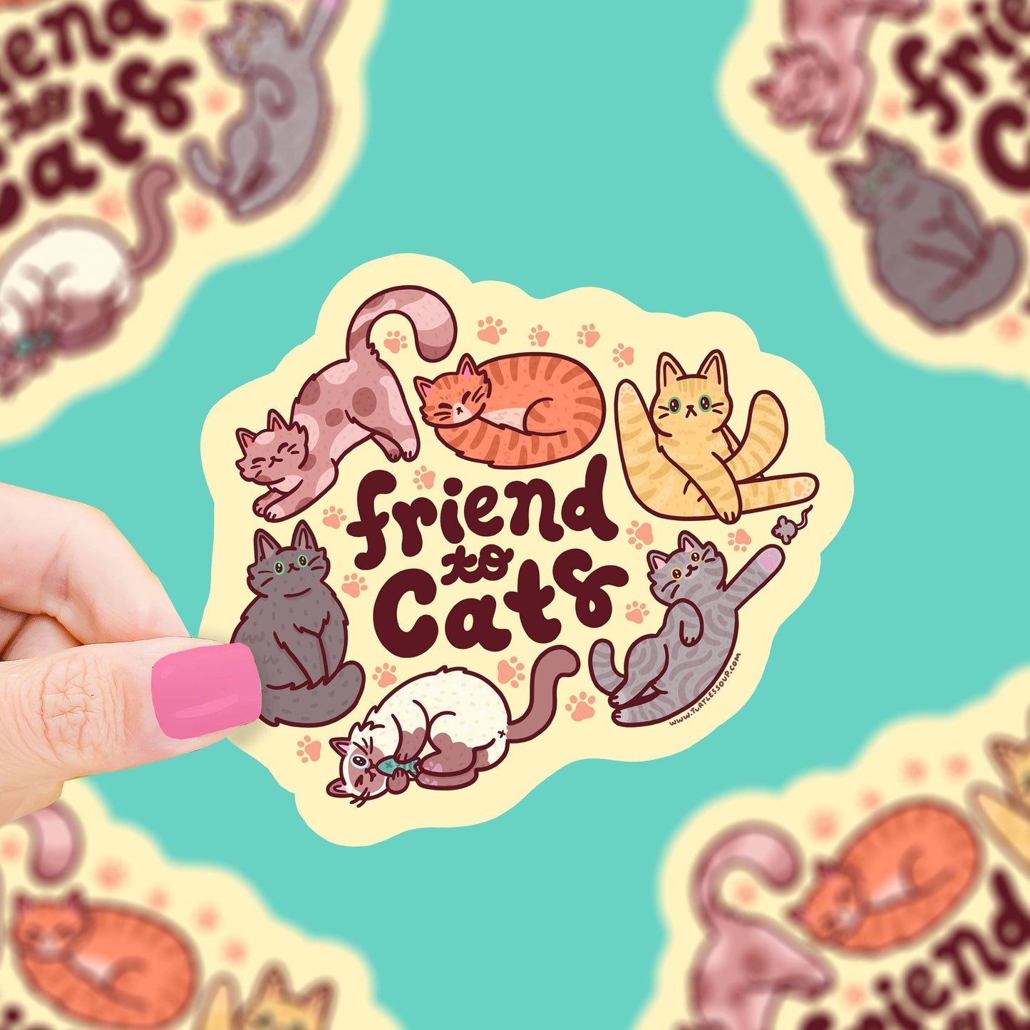 Pegatina troquelada con 6 gatos en diferentes posiciones alrededor del mensaje "Friend to cats"