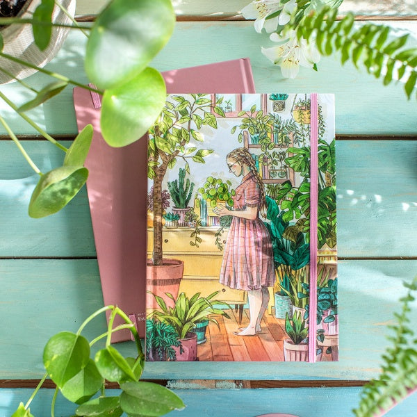 Agenda 2024 de Esther Gili con la portada de una chica rodeada de plantas