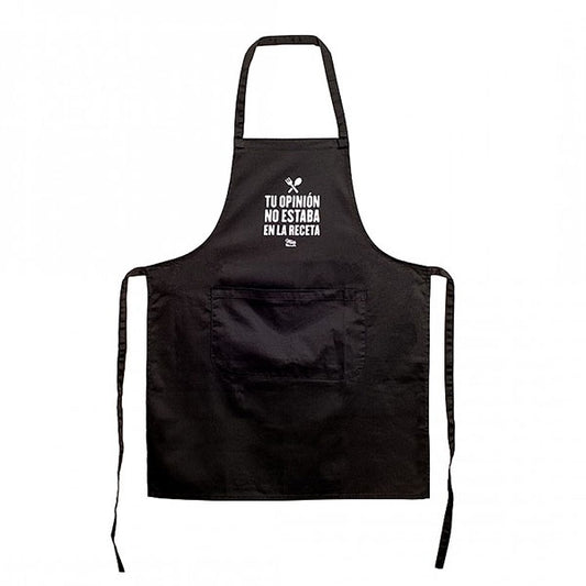 Delantal de tela negro con bolsillo y el mensaje "Tu opinión no estaba en la receta" en letras mayúsculas blancas