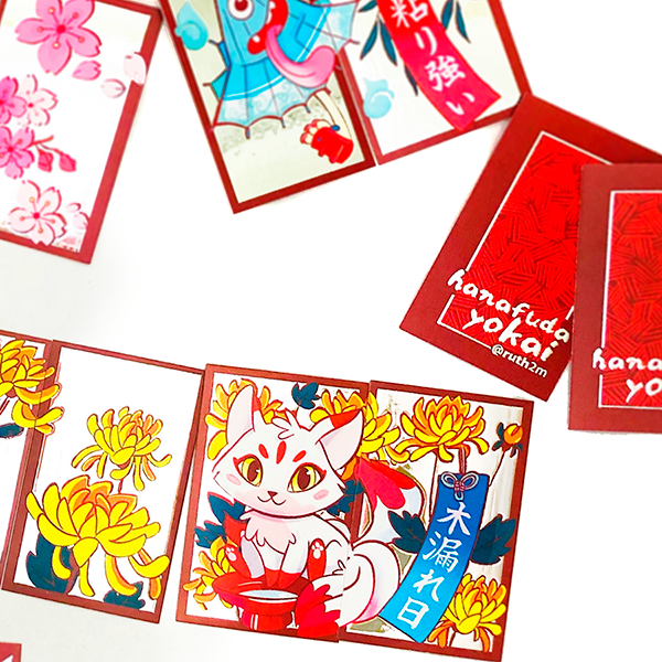 Cartas ilustradas de la baraja Hanafuda Yokai de Ruth Martínez con temática floral y yokai japoneses de estilo kawaii