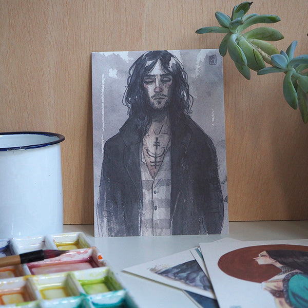 Ilustración del mago Sirius Black de la saga de Harry Potter en el pack negro con ocho postales de la ilustradora Esther Gili