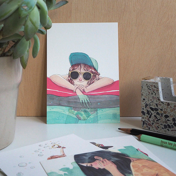 ilustración "Vivir en el agua" en el pack rojo de postales de la ilustradora Esther Gili