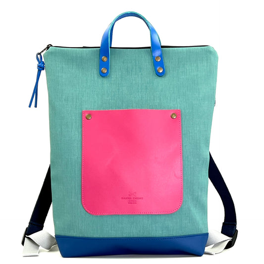 Parte delantera de mochila Slim impermeable azul turquesa y rosa de Daniel Chong