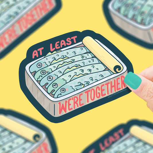 Pegatina con forma de lata de sardinas y el texto At least we're together