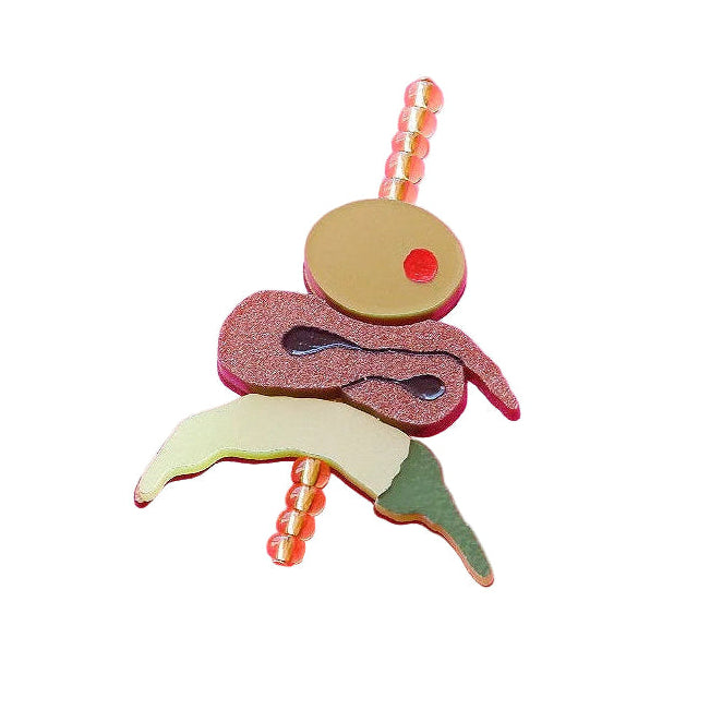 pin de metacrilato en forma de gilda 