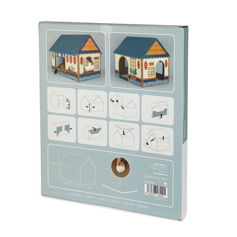 parte de atrás de la caja donde van las piezas de la casa sushi bar rascador, con las instrucciones de cómo montar la casa