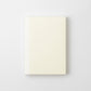 Agenda Midori MD 2027 A6 cerrada, vista frontal, tapa minimalista color crema