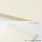 Detalle de la contraportada con logotipo MD Product en relieve y funda de papel glassine translúcida