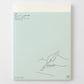 Agenda 2027 MD Products formato A4, cubierta verde menta con ilustración de mano escribiendo y logotipo MD Product