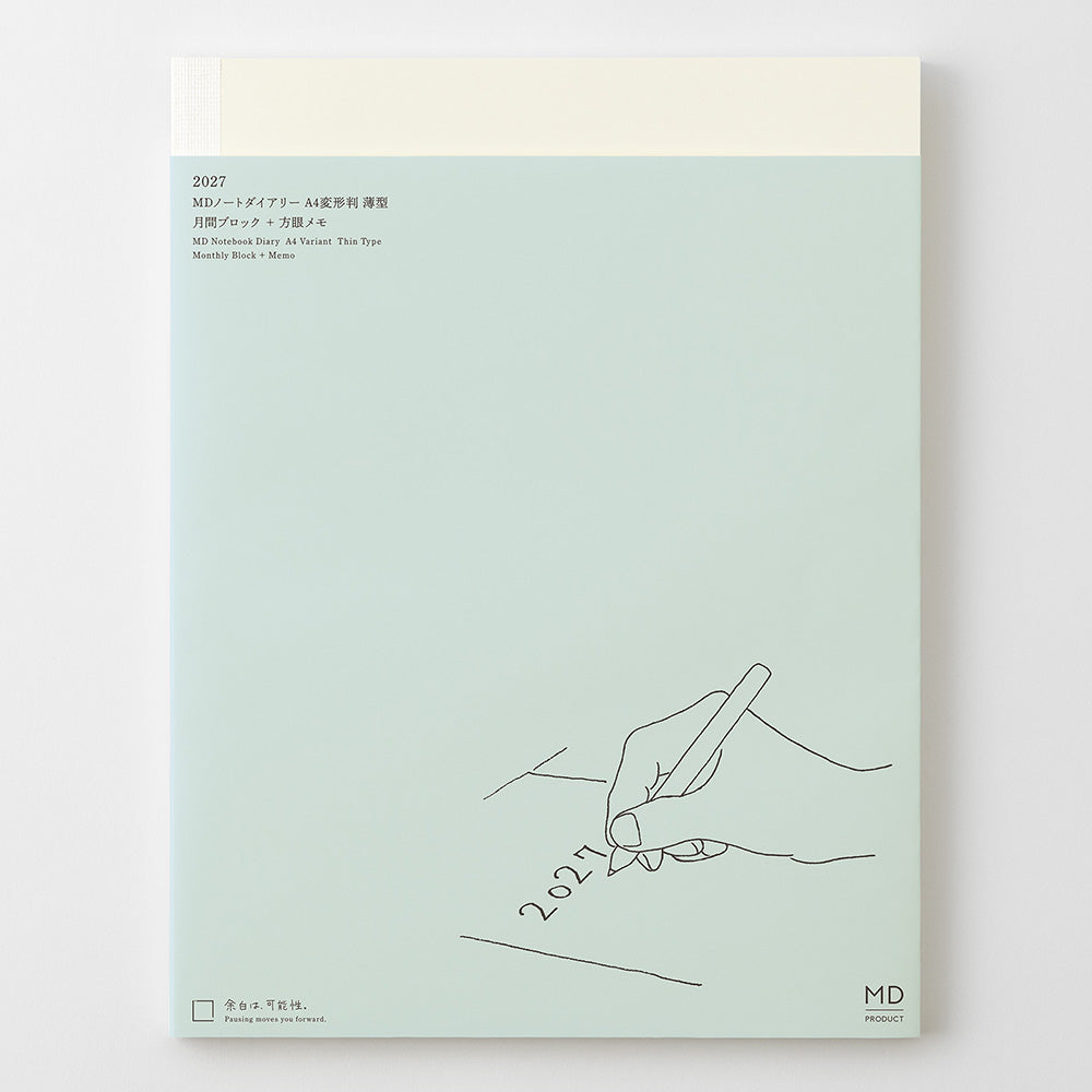 Agenda 2027 MD Products formato A4, cubierta verde menta con ilustración de mano escribiendo y logotipo MD Product