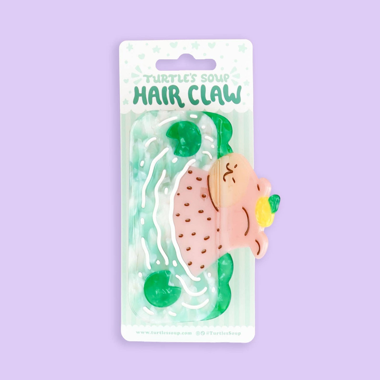 Pinza de pelo grande con forma de Capibara tomando un baño