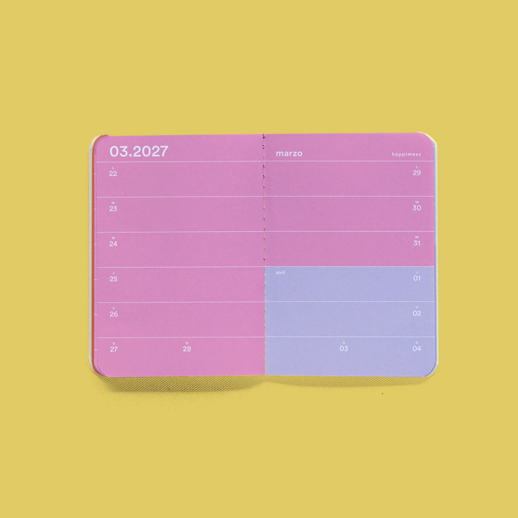 agenda confetti hapimess de monoblock abierta con un spread semanal en color morado