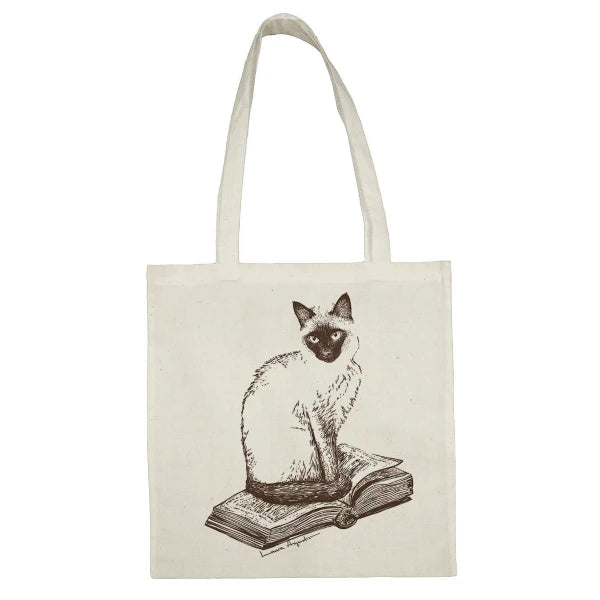 Bolsa de tela o tote bag ilustrada por Laura Agustí con un Gato siamés sobre un libro abierto