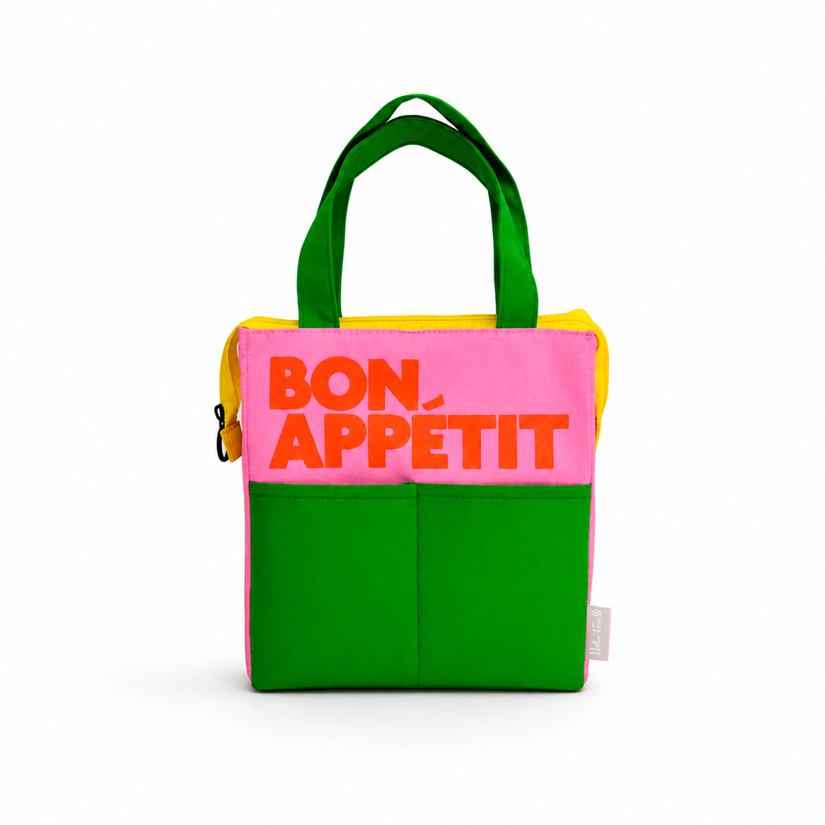 «Bolsa de almuerzo isotérmica Bon Appétit de Helio Ferretti, rosa con bolsillos y asas verdes, cremallera amarilla y letras naranjas.»