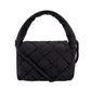 Mini bolso acolchado Ani de Lefrik en negro con solapa de tejido trenzado y bandolera, vista frontal