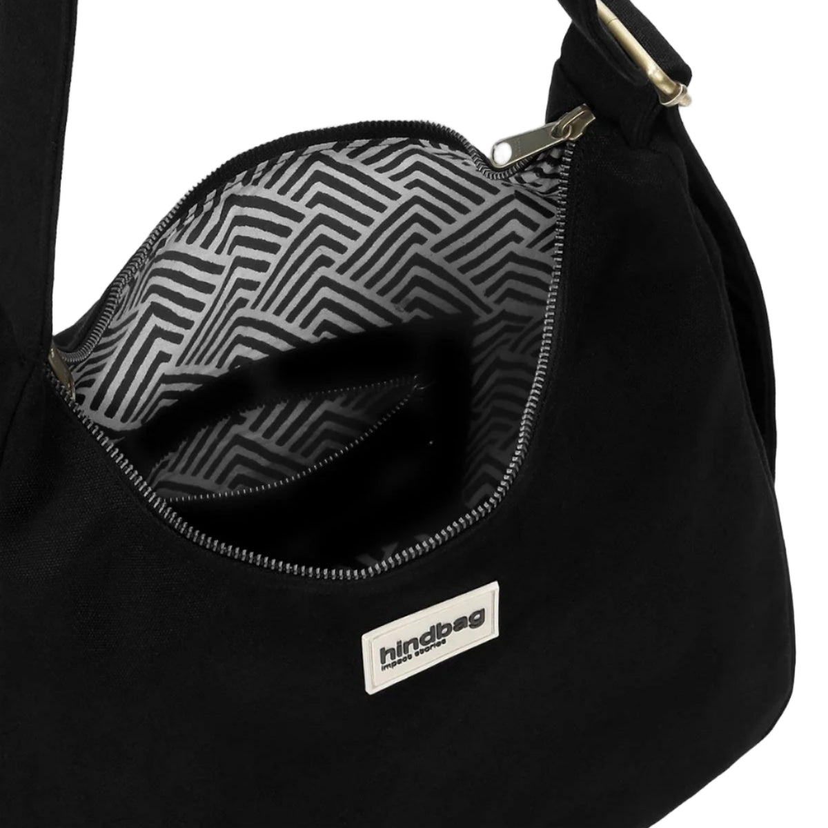 Detalle del interior del bolso de hombro azul turquesa de la marca francesa Hindbag