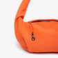 Detalle del cuelga llaves del bolso mini naranja acolchado de lefrik