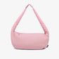 Bolso Myra acolchado de color rosa y un asa larga para llevar al hombro de la marca española Lefrik