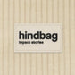 Detalle del material y la marca del bolso riñonera con cremallera de la marca francesa Hindbag de pana color beige