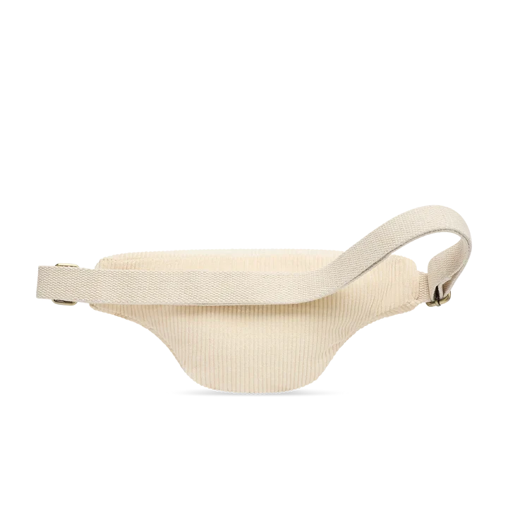 Parte de atrás del bolso riñonera con cremallera de la marca francesa Hindbag de pana color beige