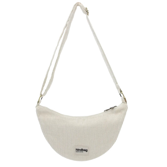 Bolso riñonera de pana beige de la marca Hindbag con forma de media luna