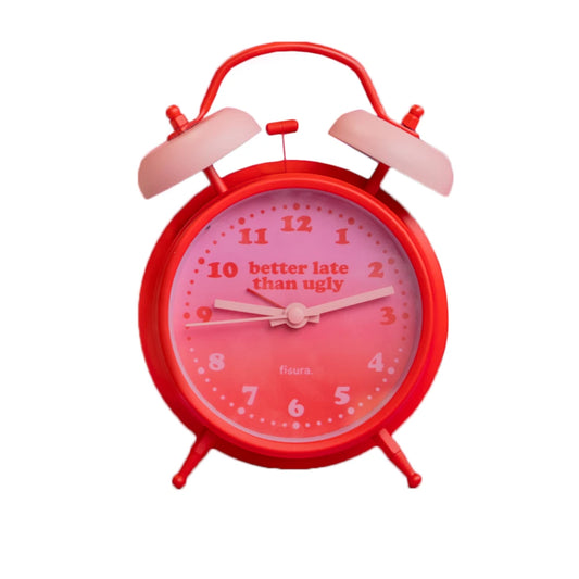 reloj despertador retro de color rosa y rojo con el texto "Better late than ugly"