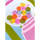 Detalle de la mini print con una máquina de caramelos de colores y el mensaje Have a sweet day. Take a break, taste the sweet. You deserve the best today.