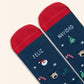 Puntera de los calcetines de Feliz Navidad con estampado de motivos navideños: Papá Nöel, reno, bastones de caramelo y árbol de Navidad