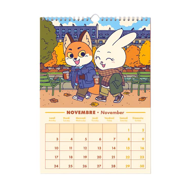 Mes de noviembre del calendario de pared 2025 de Yeaaah Studio con ilustración de zorro y coneja paseando con un café por un parque con colores de otoño