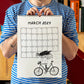 Chico con camiseta a rayas azules sosteniendo el calendario 2027 ilustrado por Helen B abierto por el mes de marzo, con ilustración de una ciclista