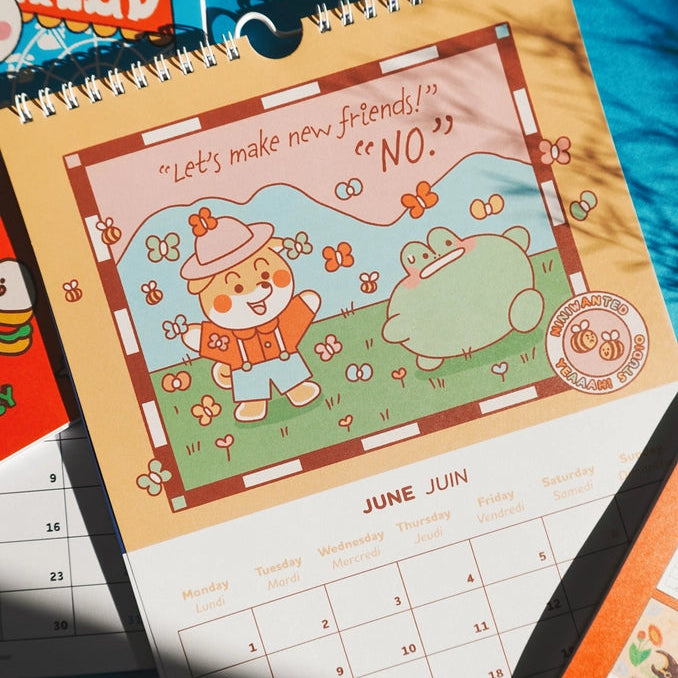 Ilustración de dos personajes en el campo en el calendario de 2026 de Yeaaah Studio y Niniwanted
