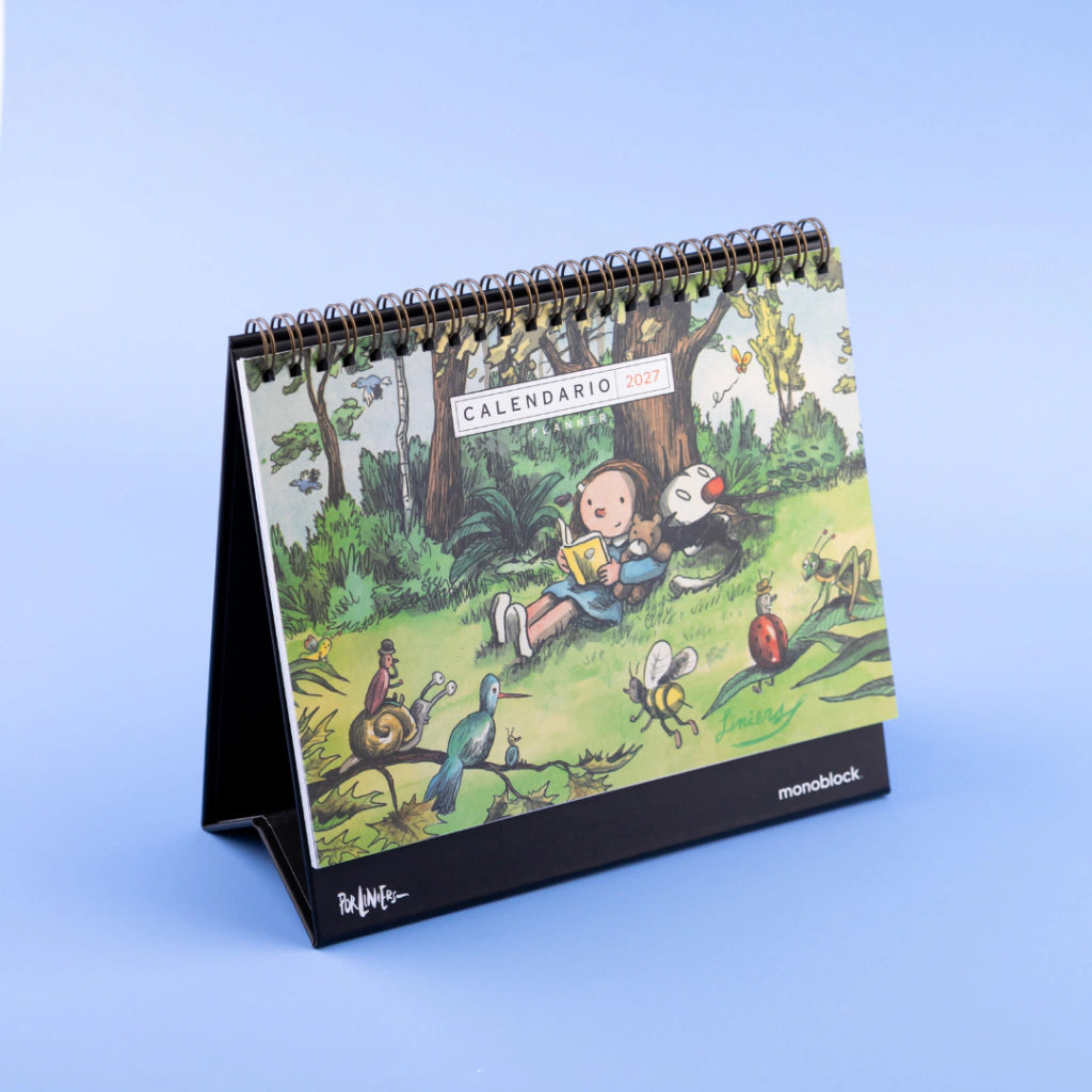 Calendario de mesa 2027 con ilustraciones de la serie Macanudo de Liniers con portada de Enriqueta y Fellini leyendo bajo un árbol rodeados de animalitos