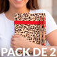 persona llevando una libreta con dos bolis enganchados en una goma de libreta con estampado de leopardo y el texto My wild Week