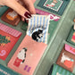 Bolsillos interiores del calendario de Adviento con 25 regalitos de temática gatuna perfecto para amantes de los gatos