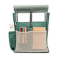 Interior de la mochila Handy mini Arles Acacia de Lefrik, con forro de rayas verdes, compartimento para portátil y bolsillos de malla con accesorios.