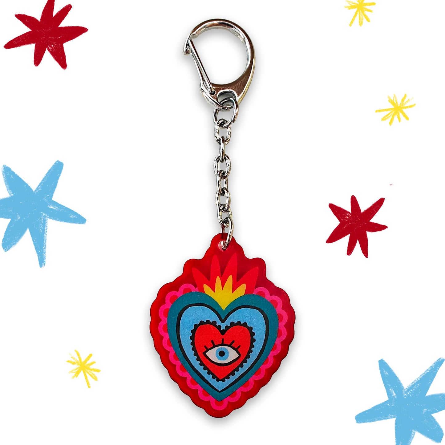 Llavero Corazón Mexicano de Laura Ortiz con corazones concetricos rojo amarillo azul y blanco y en el centro un ojo