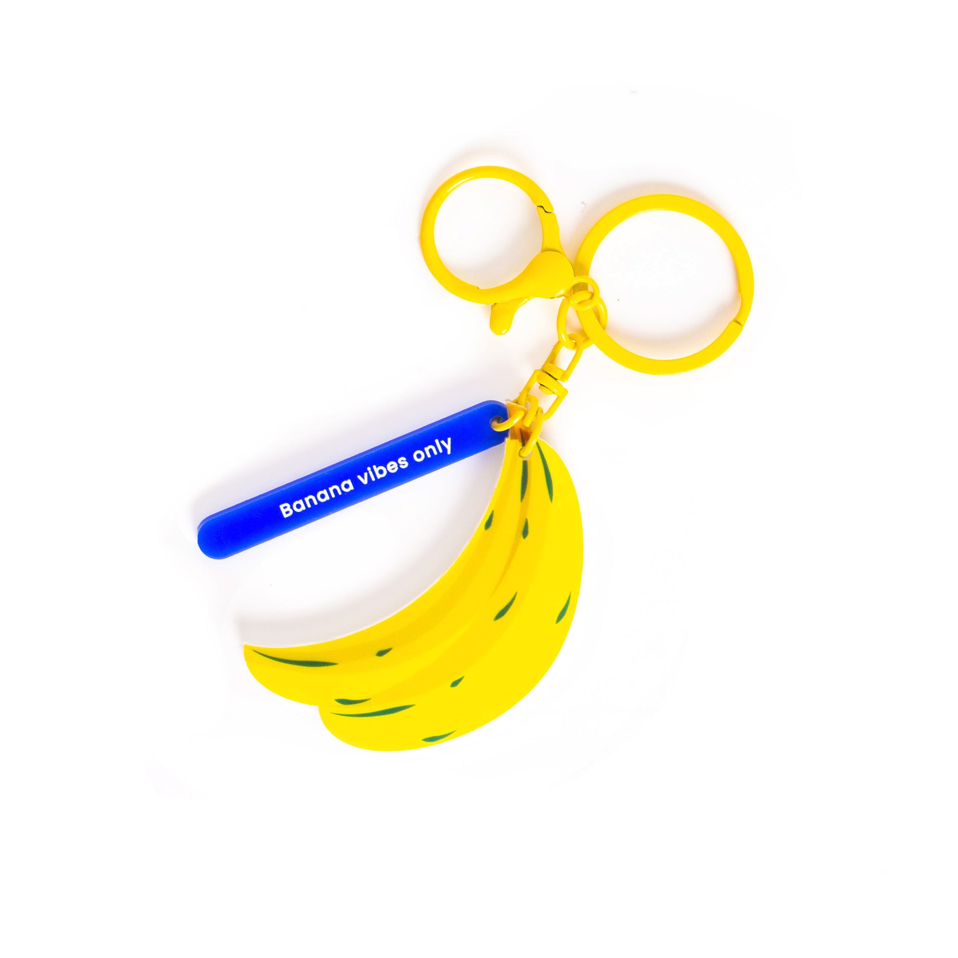 Llavero con argolla y mosquetón con forma de plátanos amarillos y un cartelito "Banana vibes only"