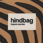 EL logo de Hindbag sobre una tela estampada cebra color canela de fondo. 