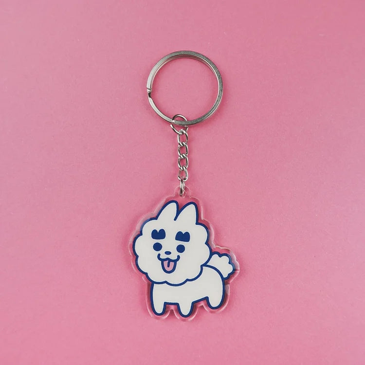 Llavero de acrílico reciclado con forma de perro caniche blanco