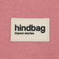 Logo de Hindbag sobre tela de tono rosa.