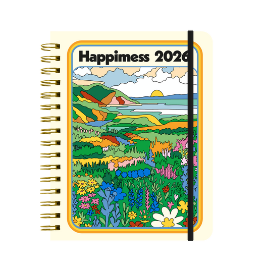 Portada con ilustración de un paisaje de colores de la agenda de Happimess Mis sueños me necesitan 2026 con organización diaria